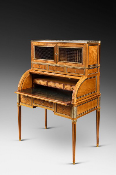 A rare Louis XVI ormolu-mounted lime wood and amaranth bureau cylindre by G.Dester