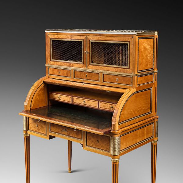 A rare Louis XVI ormolu-mounted lime wood and amaranth bureau cylindre by G.Dester