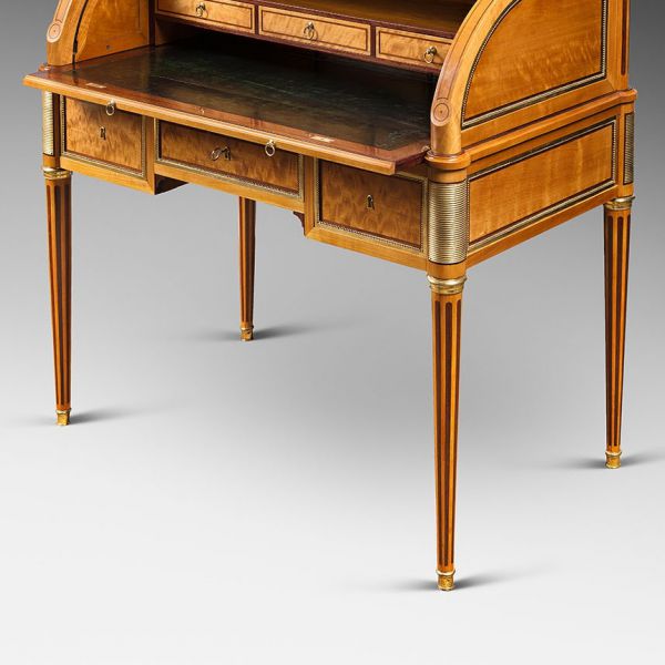 A rare Louis XVI ormolu-mounted lime wood and amaranth bureau cylindre by G.Dester