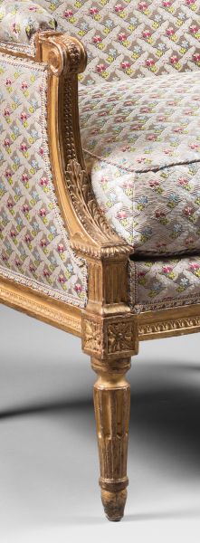 A pair of Louis XVI gilded wood bergeres
