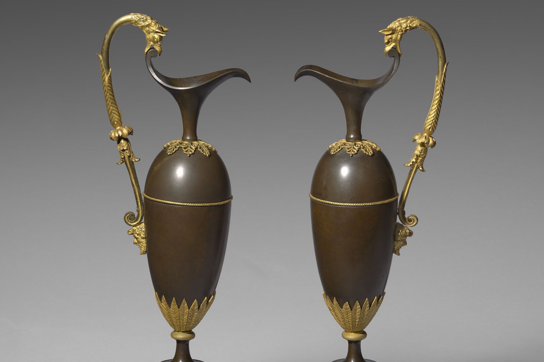 A pair of Empire period ewers