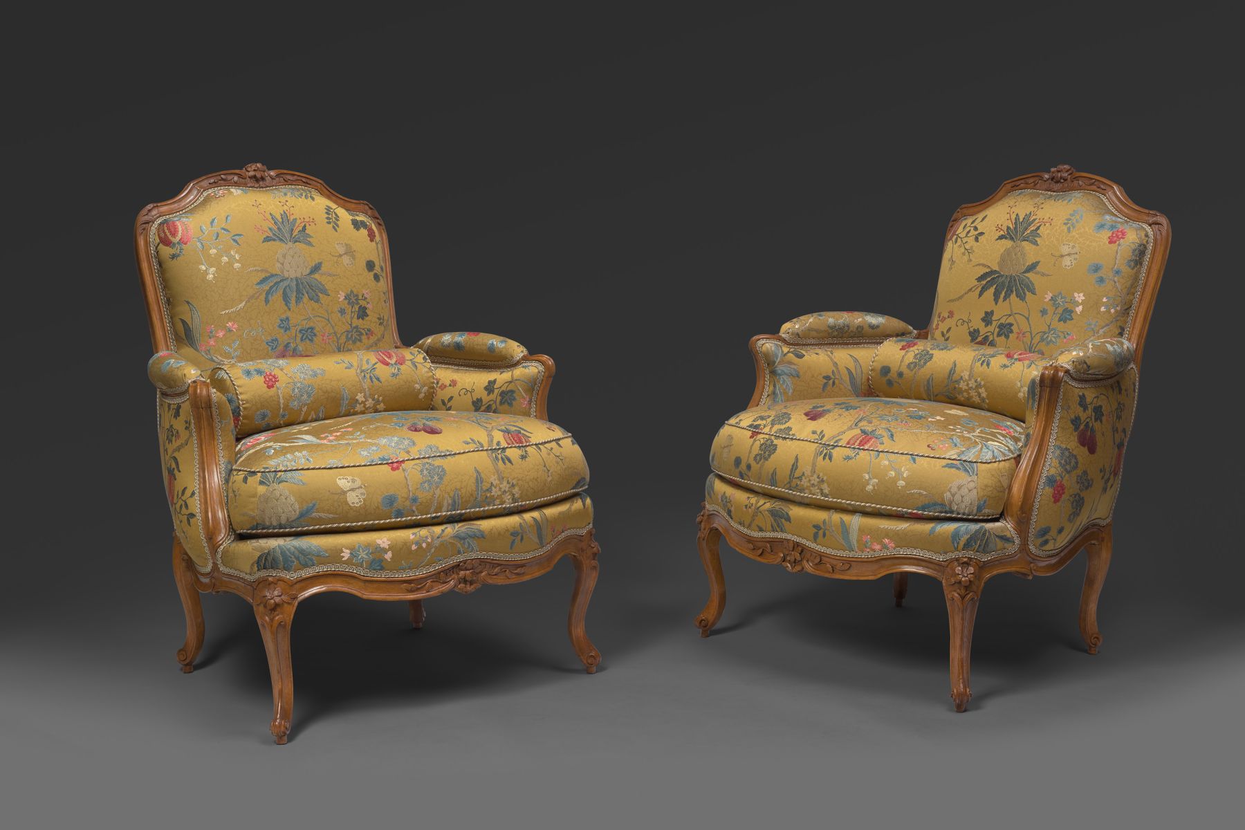 A pair of Louis XV bergeres stamped Meunier