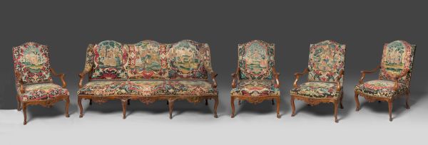 Rare suite de 4 fauteuils et un canapé d