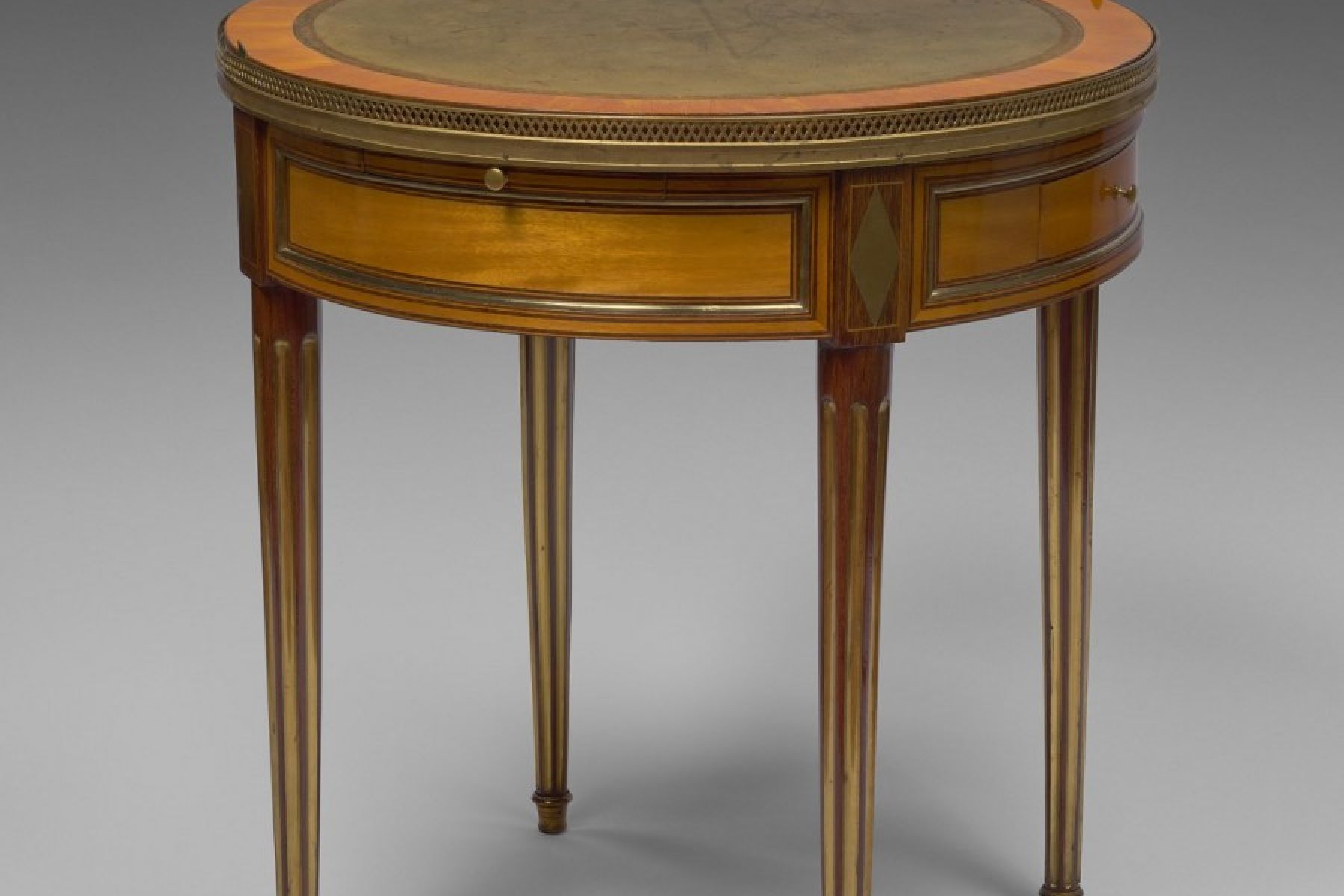 A Louis XVI bouillotte table stamped Pafrat