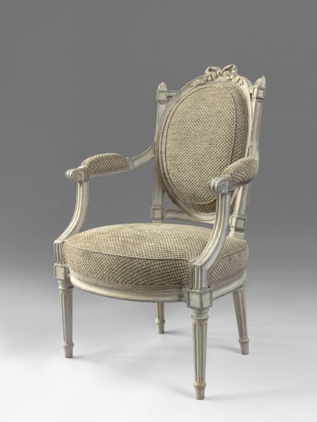 A pair of Louis XVI lacquered armchairs