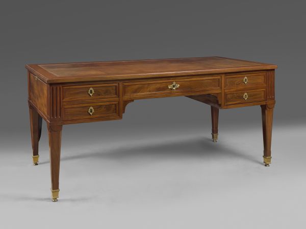 A Louis XVI mahogany bureau plat